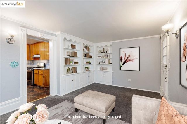 a dining room with furniture and a fireplace