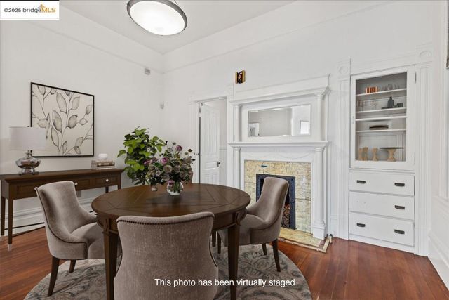 a bedroom with furniture and a large window