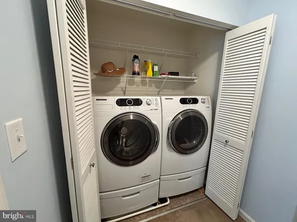 a utility room with dryer and washer