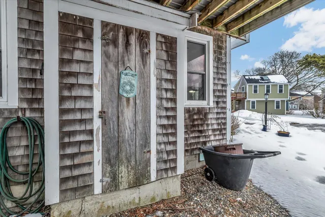 a view of a living room and balcony