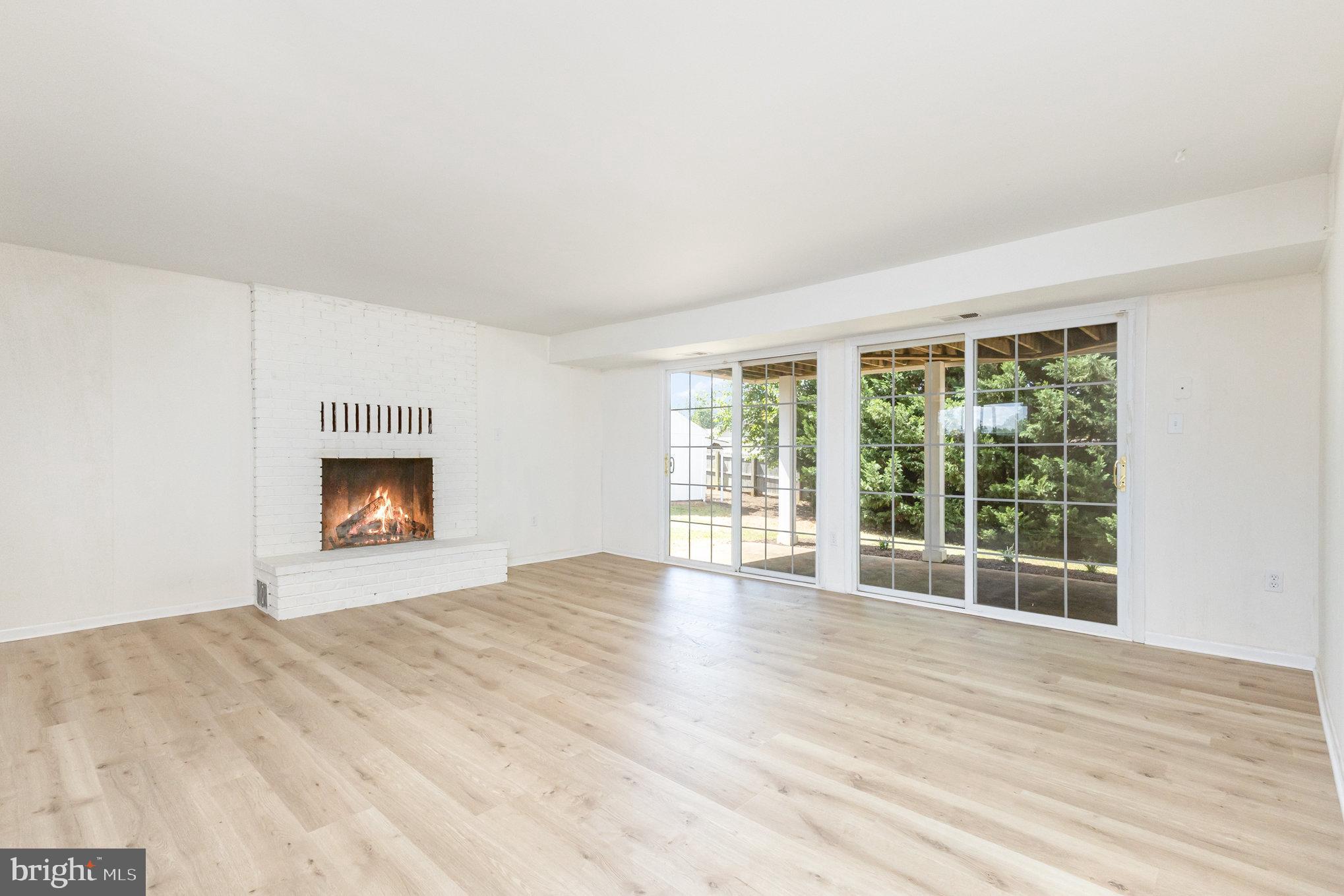 4216 High Ridge Road Haymarket, VA 20169 - Photo 18 of 34 Lower level family room w/wood burning fireplace