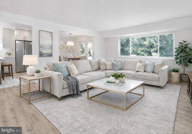 4216 High Ridge Road Haymarket, VA 20169 - Photo 5 of 34 Main level living room virtually staged