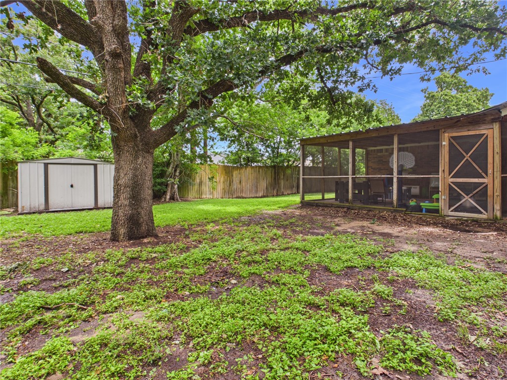 800 Rio Grande Lane Bryan, TX 77801 - Photo 21 of 23 a backyard of a house with lots of green space