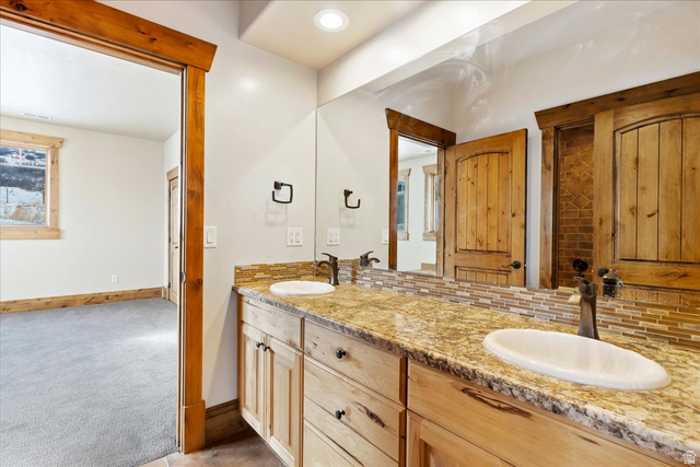 246 Woods Creek Road Morgan, UT 84050 - Photo 49 of 69 Double vanity with granite countertop and dual oval sinks