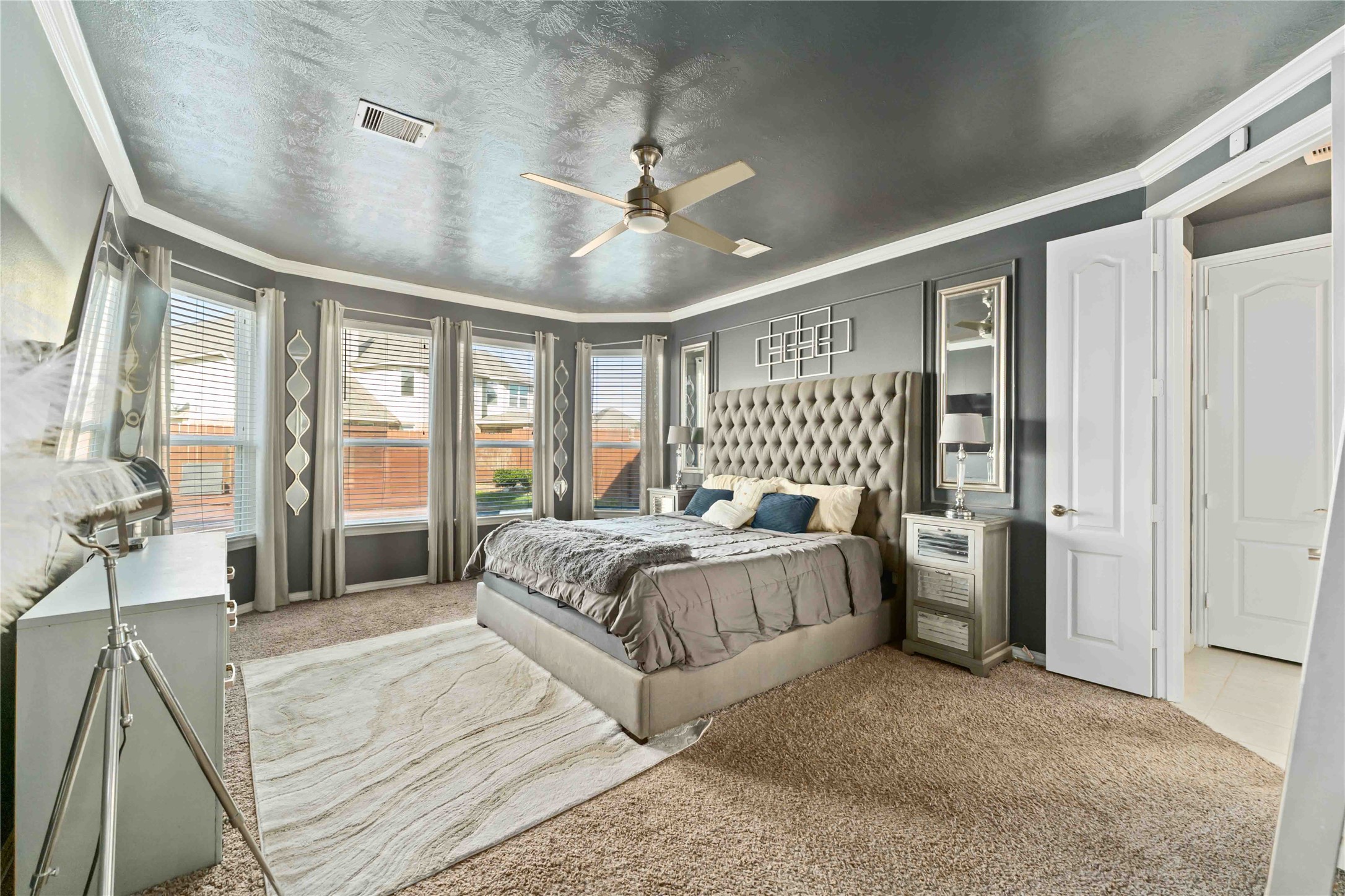 7403 Dry Stone Lane Rosenberg, TX 77469 - Photo 11 of 19 Your primary suite is spacious, serene, and complete with huge Bay Windows. Designed to feel like a true retreat, it offers plenty of room to unwind, recharge, and truly feel at home.