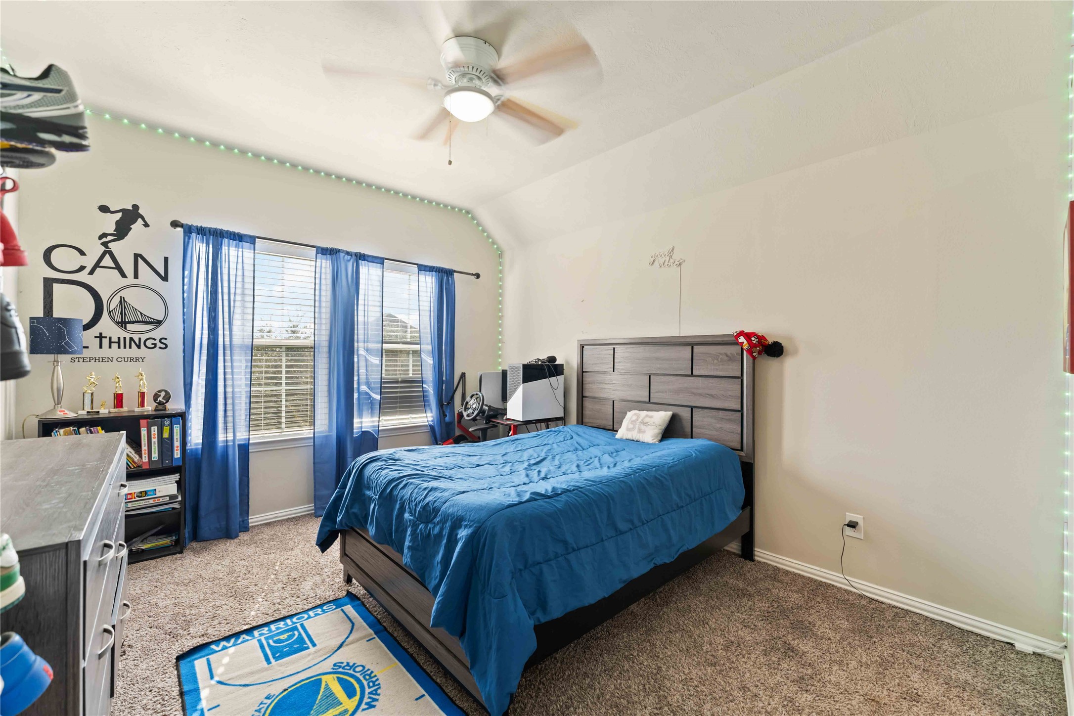 7403 Dry Stone Lane Rosenberg, TX 77469 - Photo 13 of 19 This guest bedroom is bright, comfortable, and thoughtfully sized, making it ideal for visitors or extended stays.