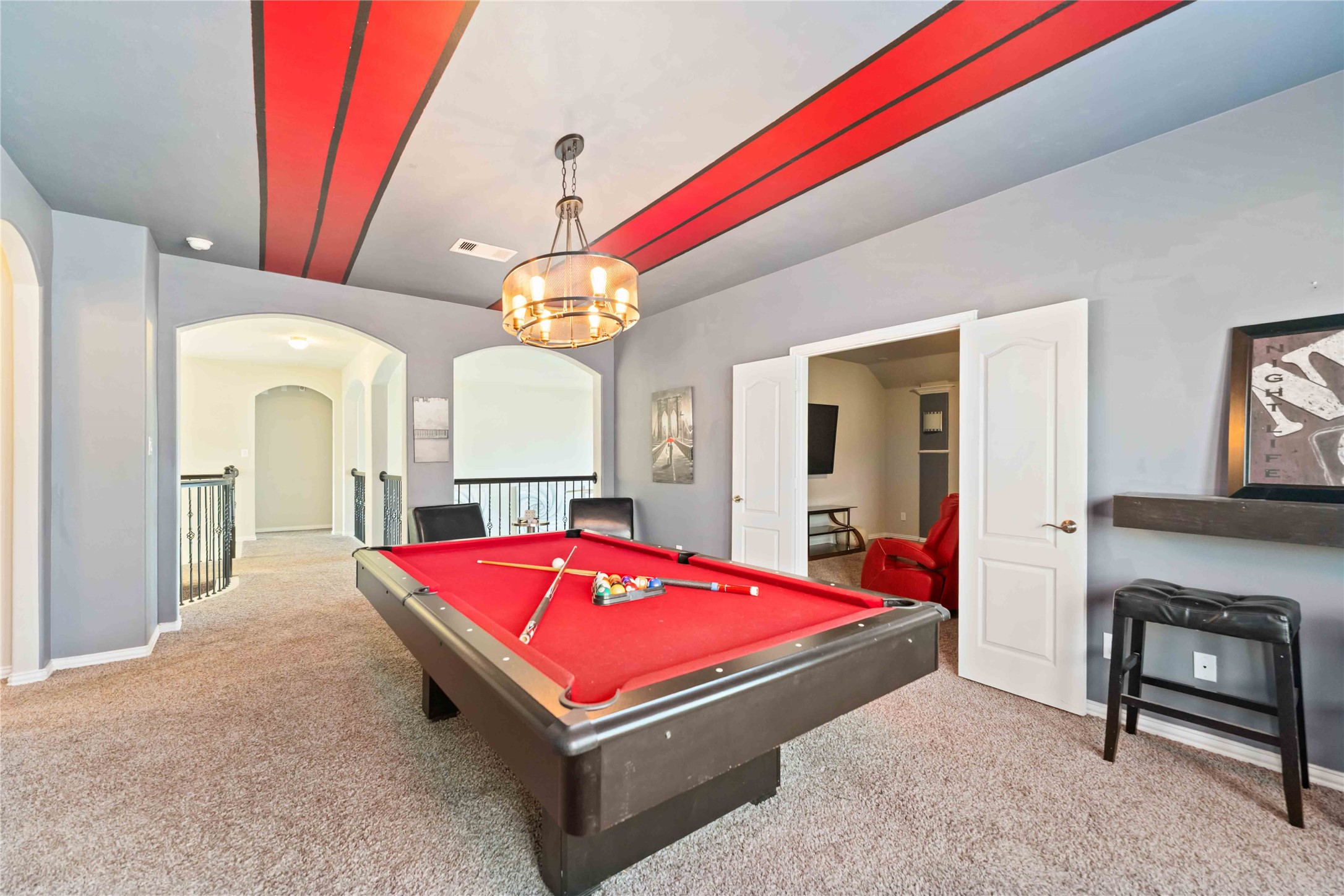 7403 Dry Stone Lane Rosenberg, TX 77469 - Photo 16 of 19 The game room is designed for fun, connection, and entertainment, with the pool table conveying with the home. This is where game nights, celebrations, and relaxed weekends naturally come together.