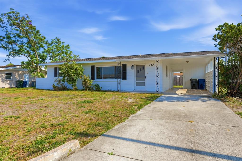 363 Glen Oak Road Venice, FL 34293 - Photo 1 of 53 a front view of house with yard