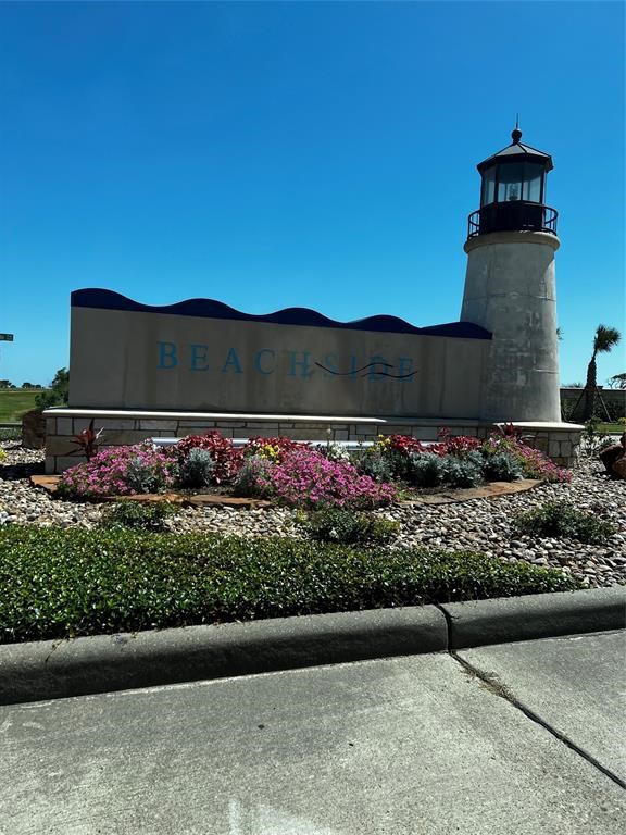 3221 Bay Rdg Drive Palacios, TX 77465 - Photo 1 of 8 a view of a street with a bench in front of it