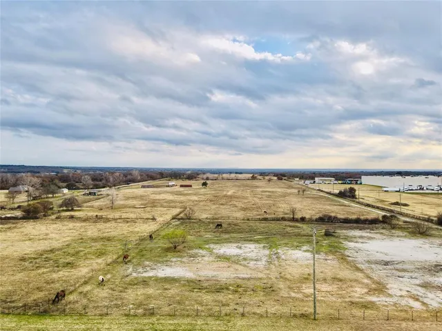 an aerial view of beach and city