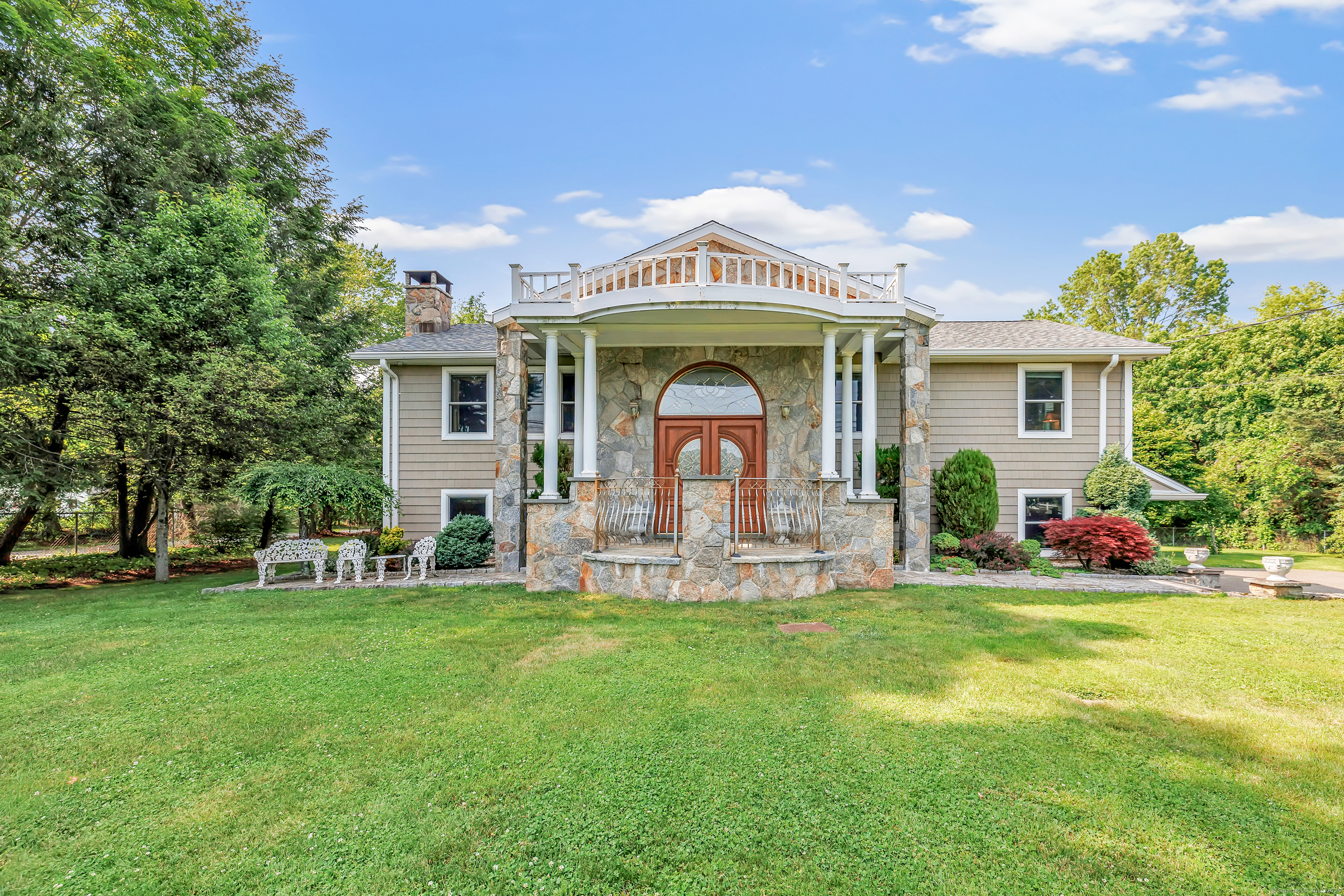 229 Mohegan Road Shelton, CT 06484 - Photo 1 of 1 a view of a house with a yard and sitting area