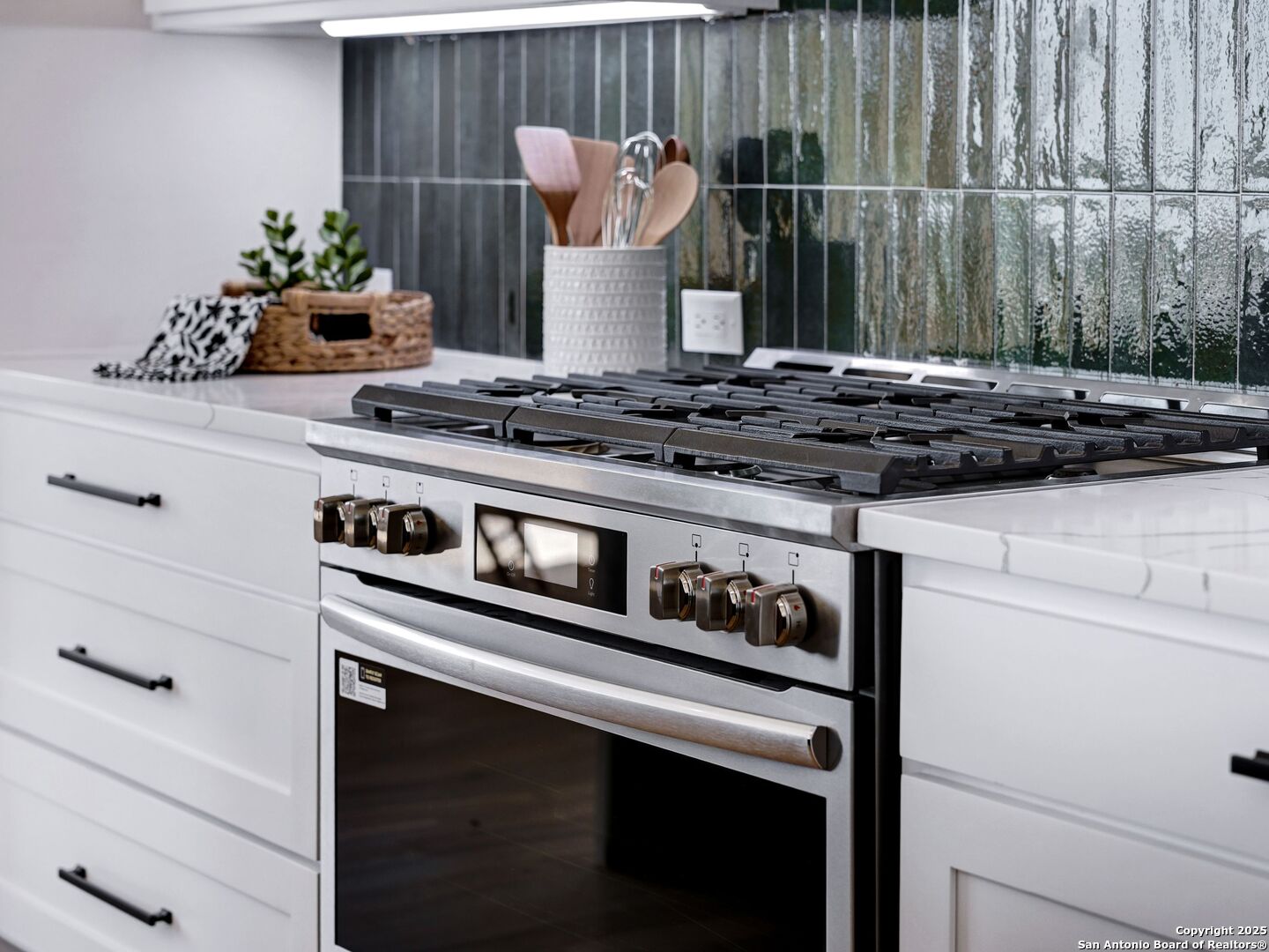 8214 Sierra Hermosa San Antonio, TX 78255 - Photo 19 of 61 a stove top oven sitting inside of a kitchen