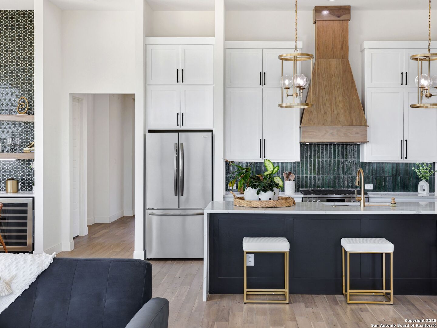 8214 Sierra Hermosa San Antonio, TX 78255 - Photo 24 of 61 a kitchen with a refrigerator and countertop