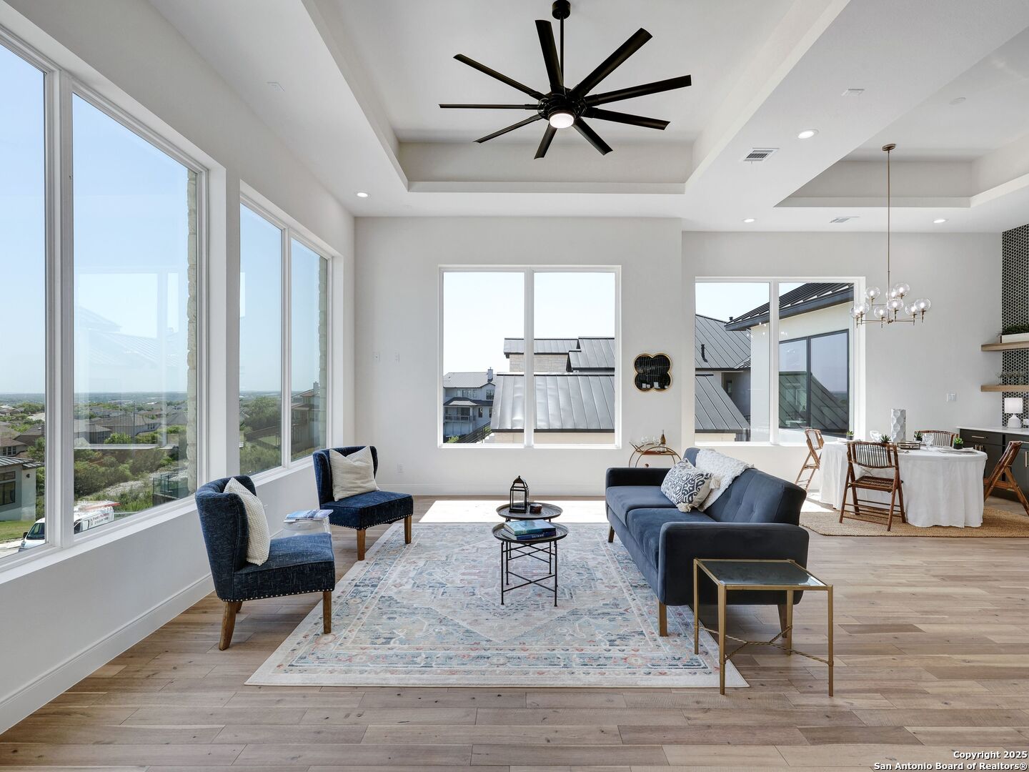 8214 Sierra Hermosa San Antonio, TX 78255 - Photo 26 of 61 a living room with furniture and a large window