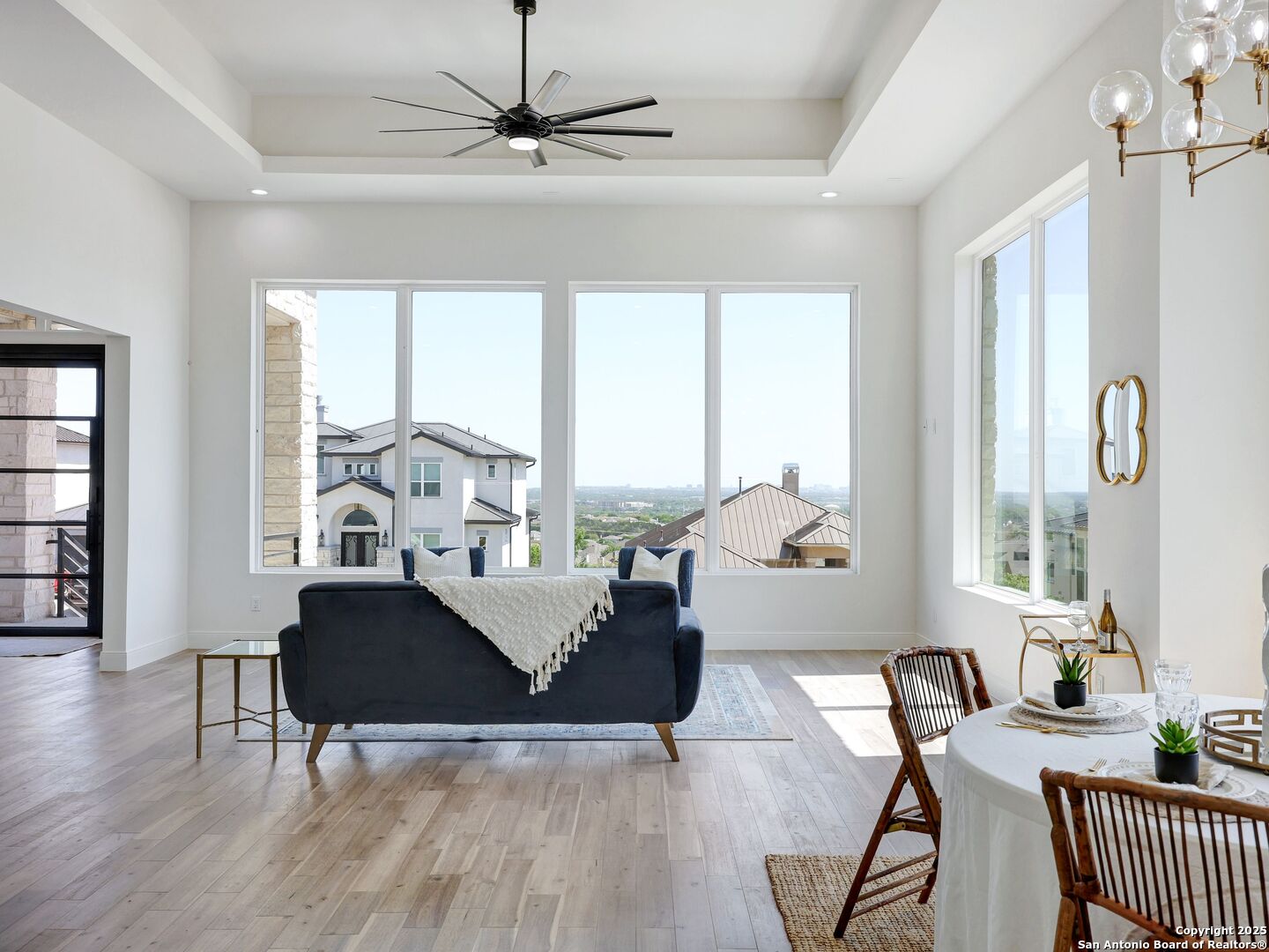 8214 Sierra Hermosa San Antonio, TX 78255 - Photo 27 of 61 a living room with furniture and a large window