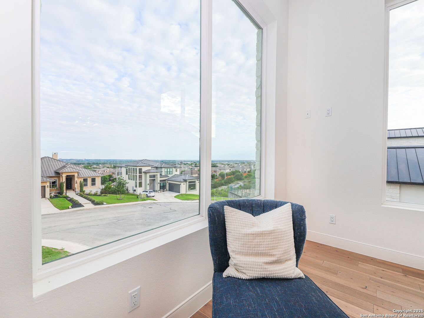 8214 Sierra Hermosa San Antonio, TX 78255 - Photo 29 of 61 a view of a chair and table in a room
