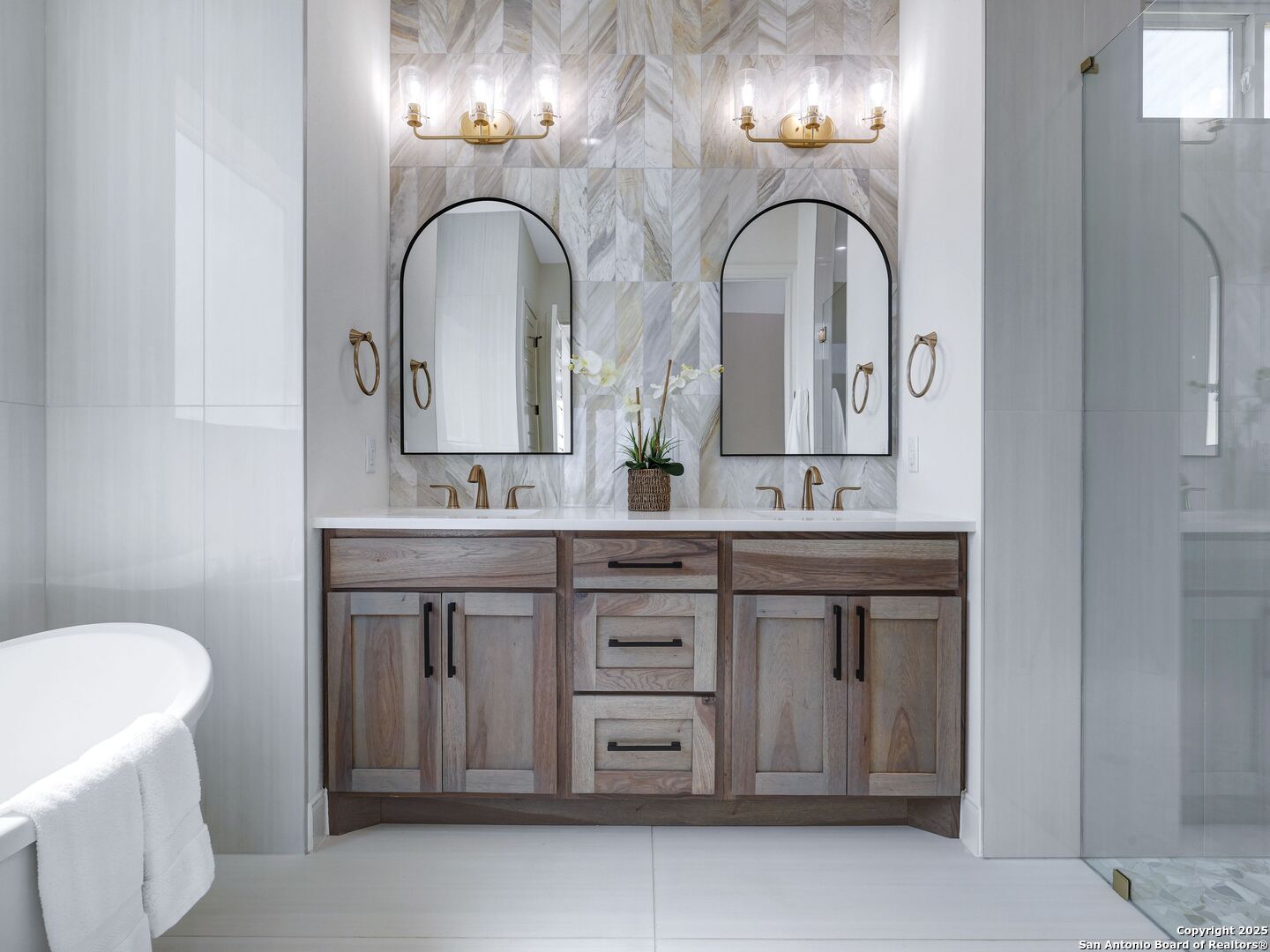 8214 Sierra Hermosa San Antonio, TX 78255 - Photo 38 of 61 a spacious bathroom with a granite countertop double vanity sink and a mirror