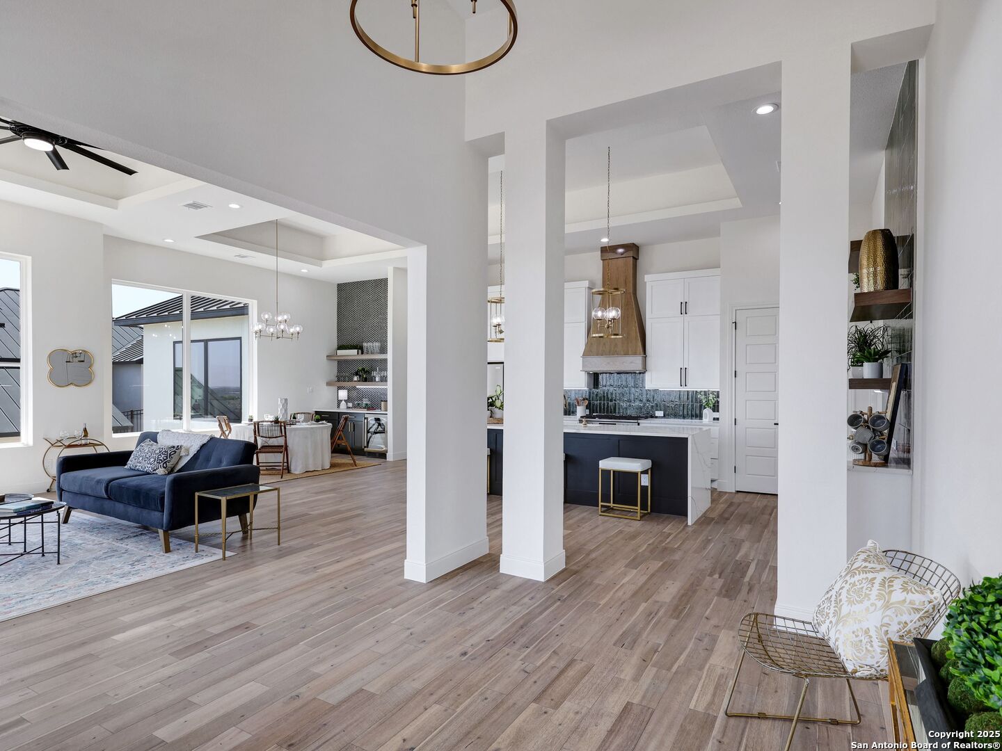 8214 Sierra Hermosa San Antonio, TX 78255 - Photo 5 of 61 a living room with furniture and wooden floor