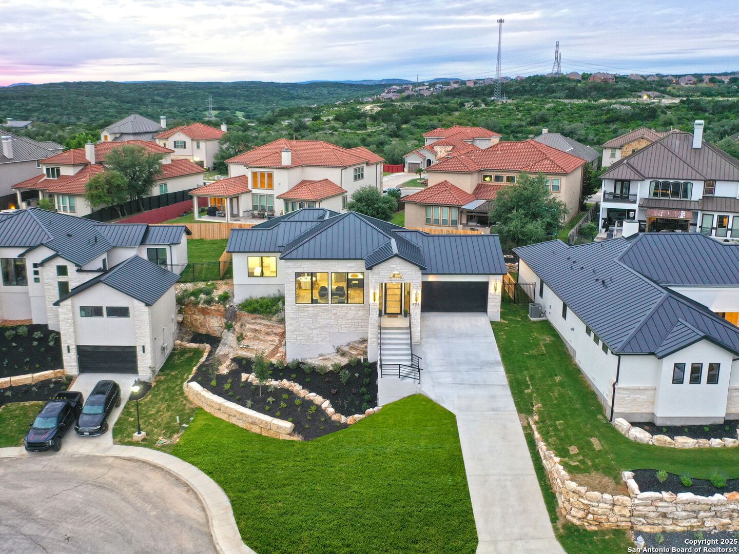 8214 Sierra Hermosa San Antonio, TX 78255 - Photo 60 of 61 an aerial view of multiple houses with yard