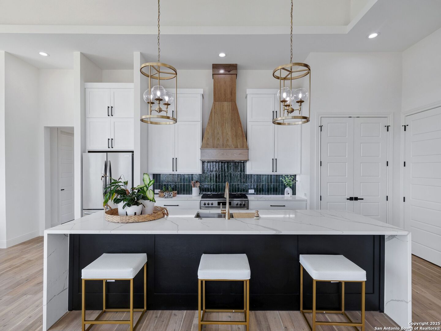 8214 Sierra Hermosa San Antonio, TX 78255 - Photo 8 of 61 a kitchen with a table and chairs in it