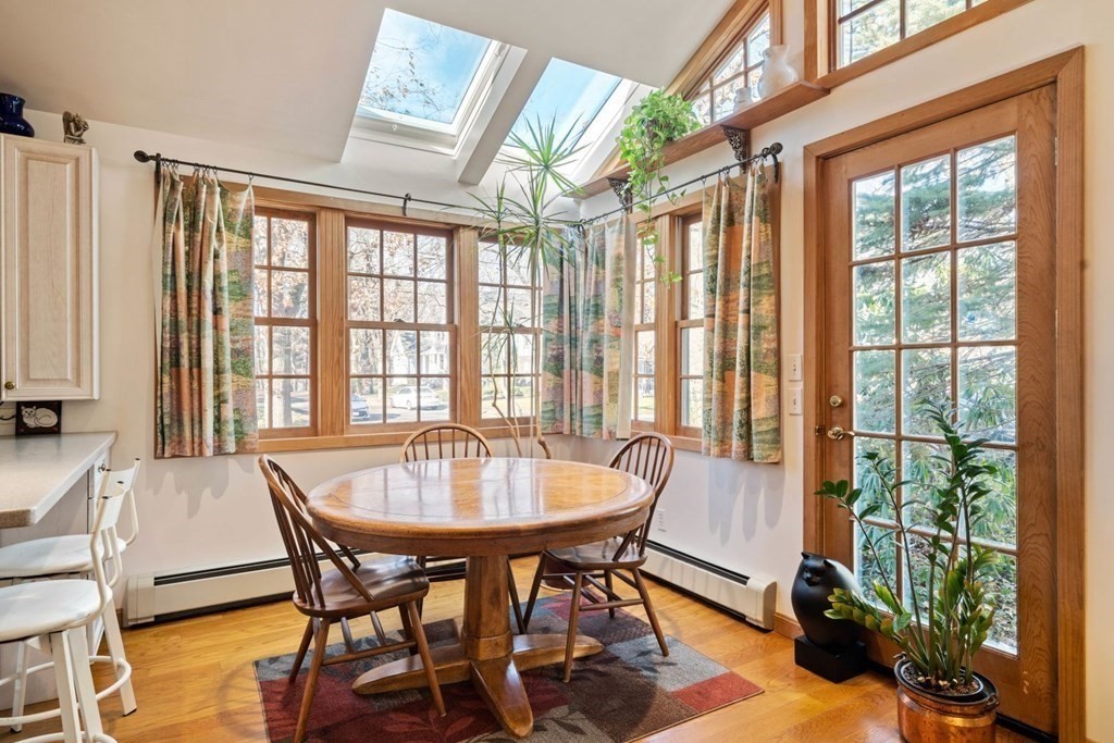 54 Manchester Road Newton, MA 02461 - Photo 13 of 40 a view of a dining room with furniture window and outside view