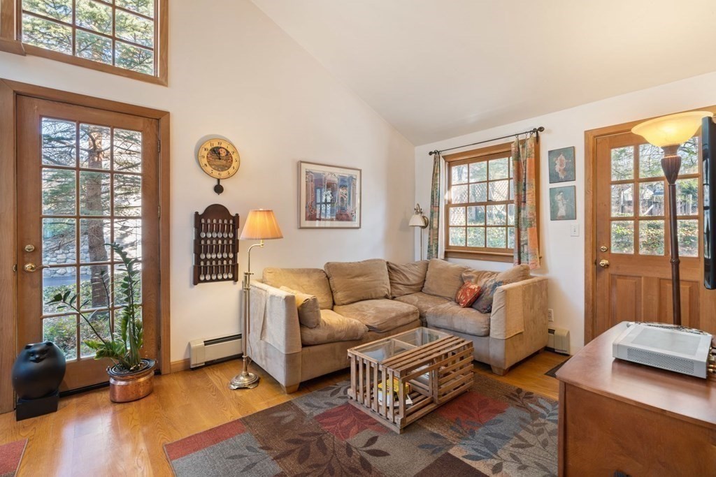 54 Manchester Road Newton, MA 02461 - Photo 16 of 40 a living room with furniture and a window
