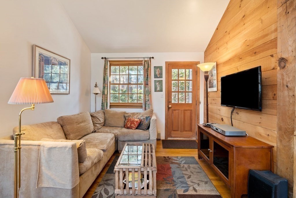 54 Manchester Road Newton, MA 02461 - Photo 18 of 40 a living room with furniture and a flat screen tv