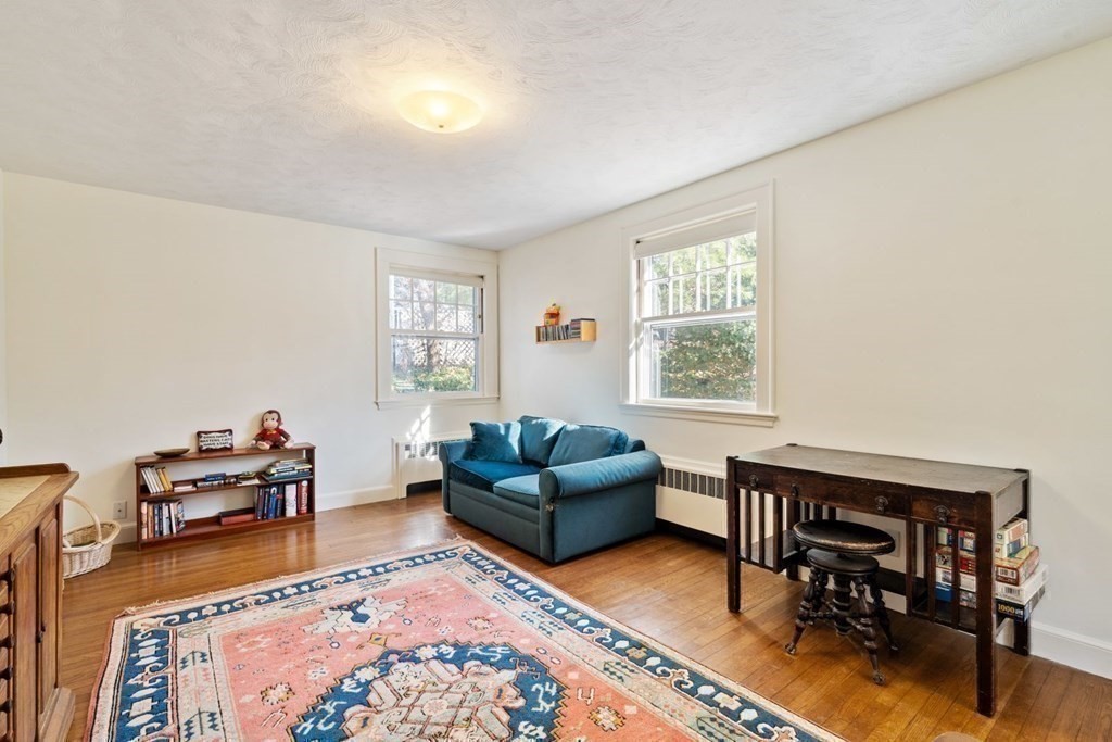 54 Manchester Road Newton, MA 02461 - Photo 20 of 40 a living room with furniture and a window