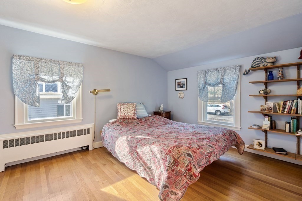54 Manchester Road Newton, MA 02461 - Photo 22 of 40 a bedroom with a bed and a window
