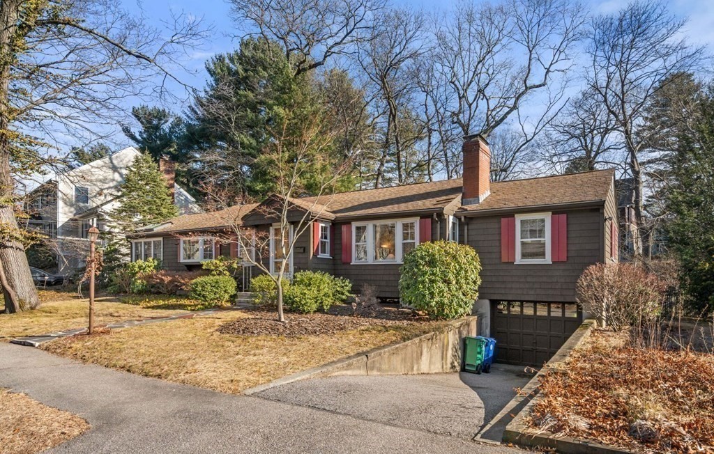 54 Manchester Road Newton, MA 02461 - Photo 32 of 40 a front view of a house with garden