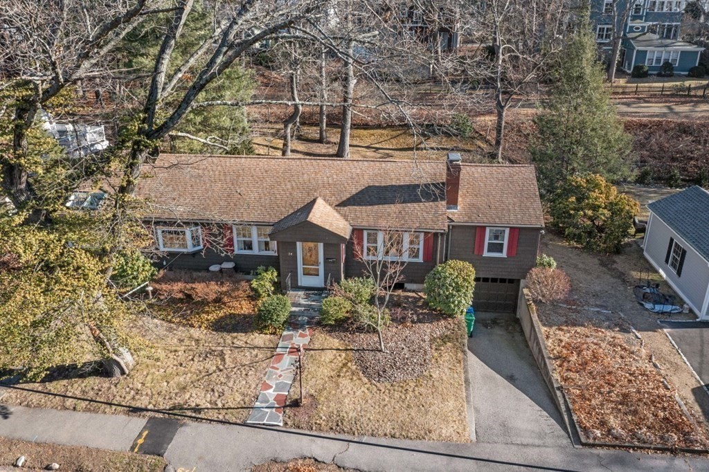 54 Manchester Road Newton, MA 02461 - Photo 36 of 40 front view of a house with a yard