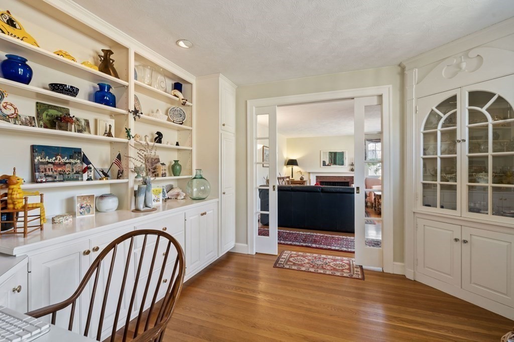 54 Manchester Road Newton, MA 02461 - Photo 7 of 40 a view of a living room and a wooden floor
