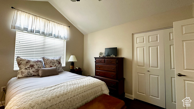 929 West 1920 South, Unit A Syracuse, UT 84075 - Photo 10 of 26 Bedroom with lofted ceiling, a closet, and ceiling fan