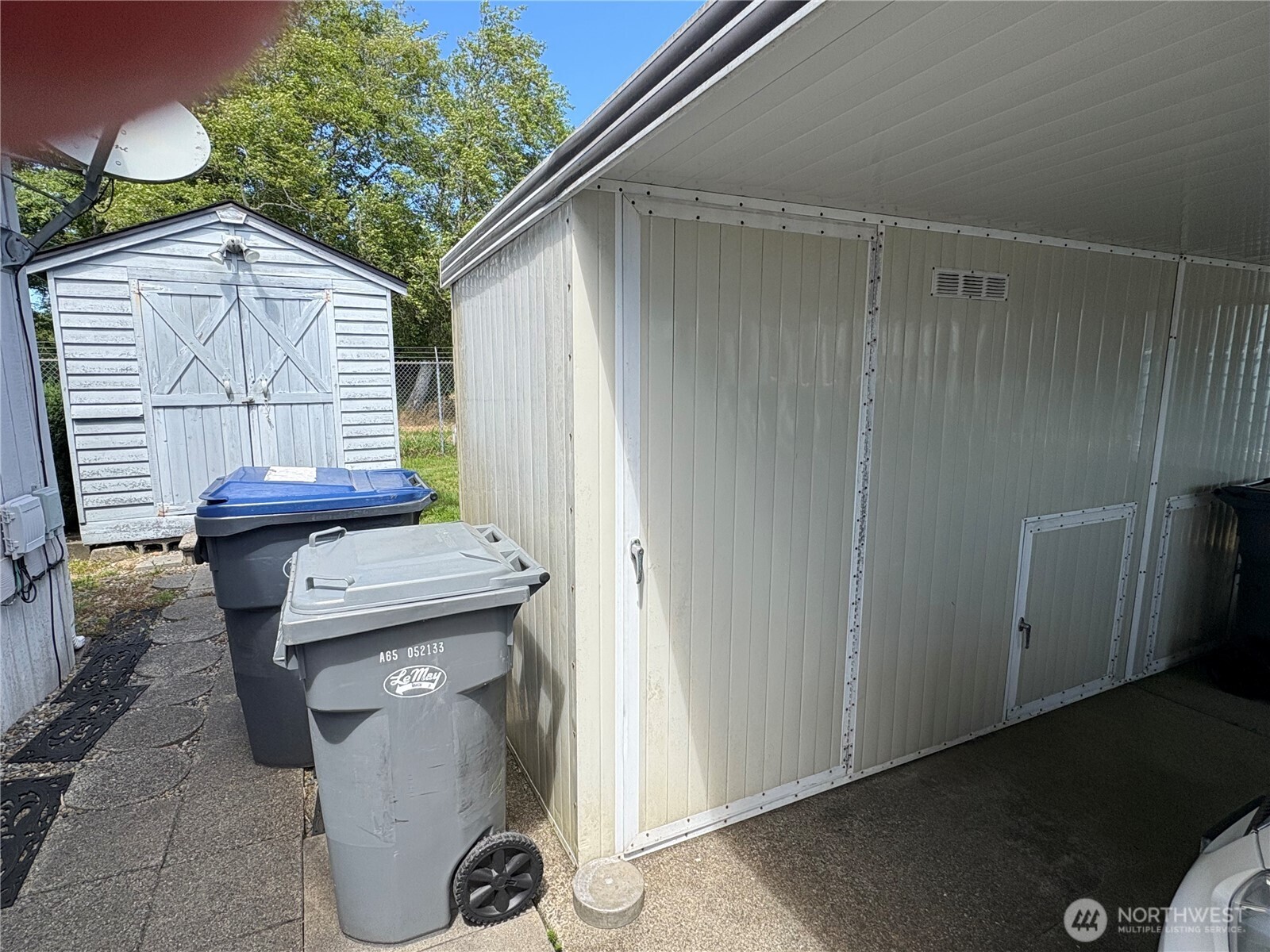 51 Meander Way Aberdeen, WA 98520 - Photo 18 of 22 a storage room with washer and dryer