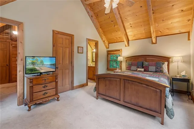 a bedroom with a bed and a cabinets