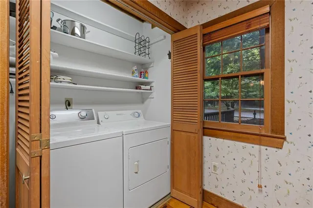 a utility room with dryer and washer