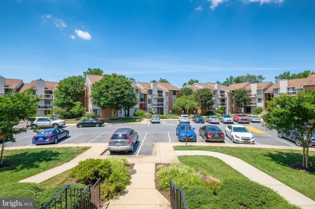 a view of a building with a yard