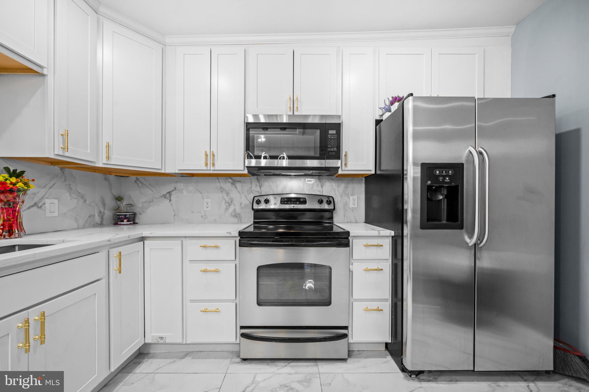 46 Boone Street Cumberland, MD 21502 - Photo 7 of 35 Modern kitchen with sleek appliances.