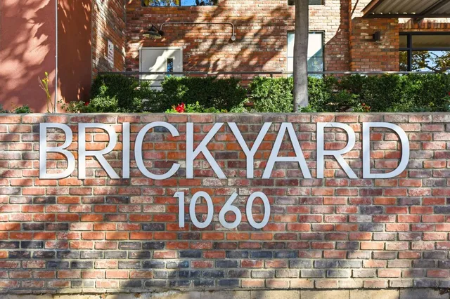 a view of a building with a bench