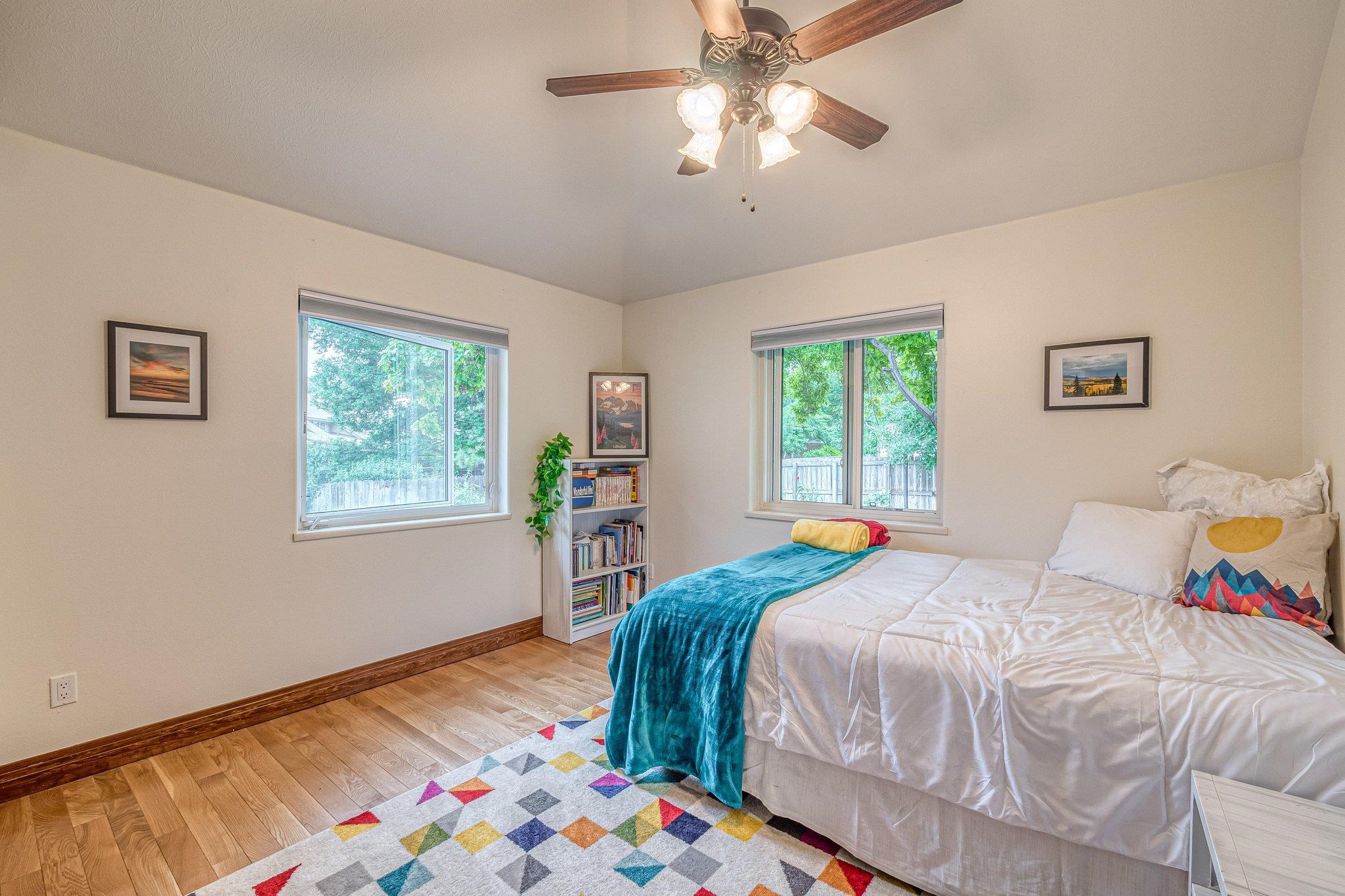 2321 South Rim Drive Grand Junction, CO 81507 - Photo 22 of 41 a bedroom with a bed and a window