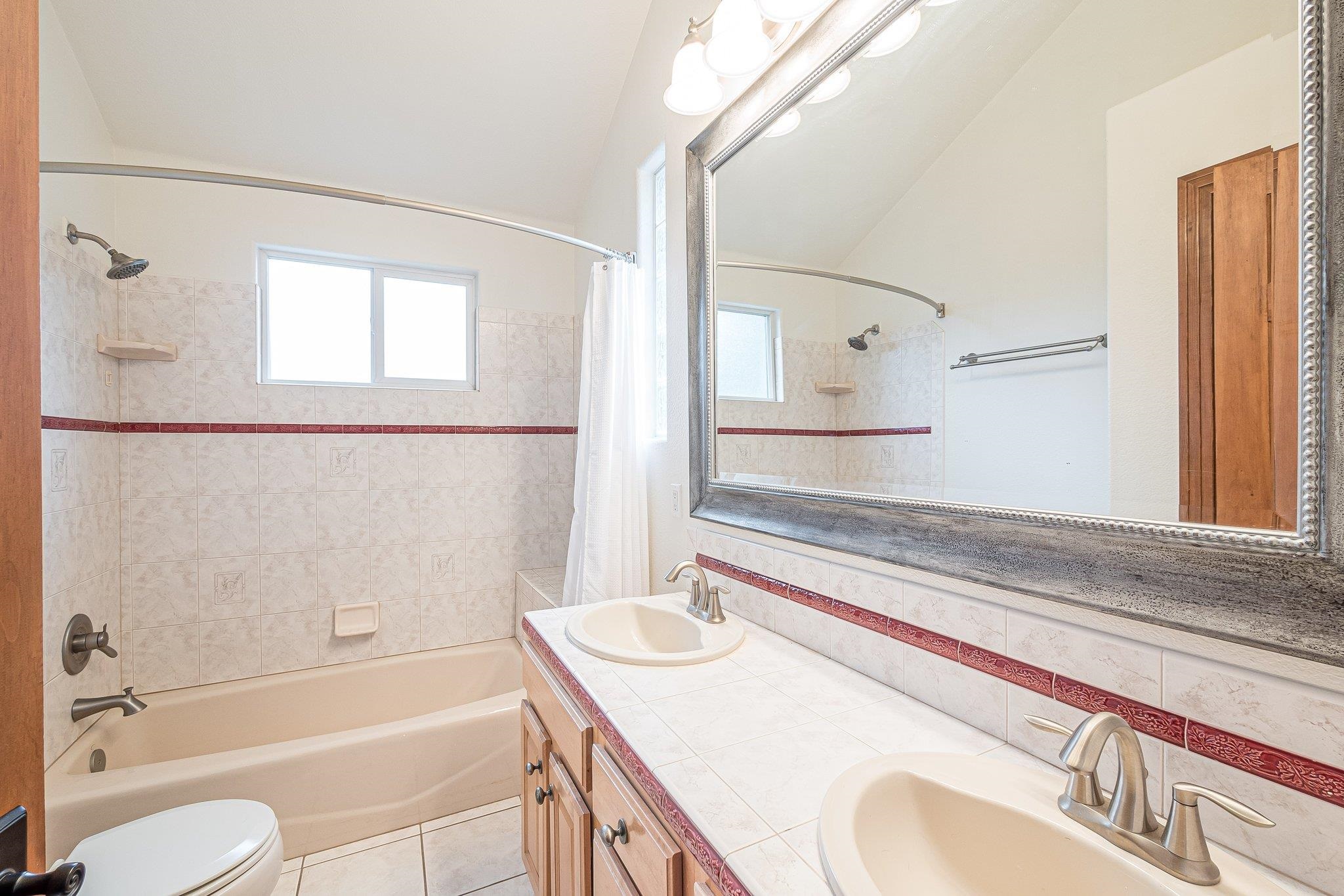 2321 South Rim Drive Grand Junction, CO 81507 - Photo 28 of 41 a bathroom with a sink and a bathtub