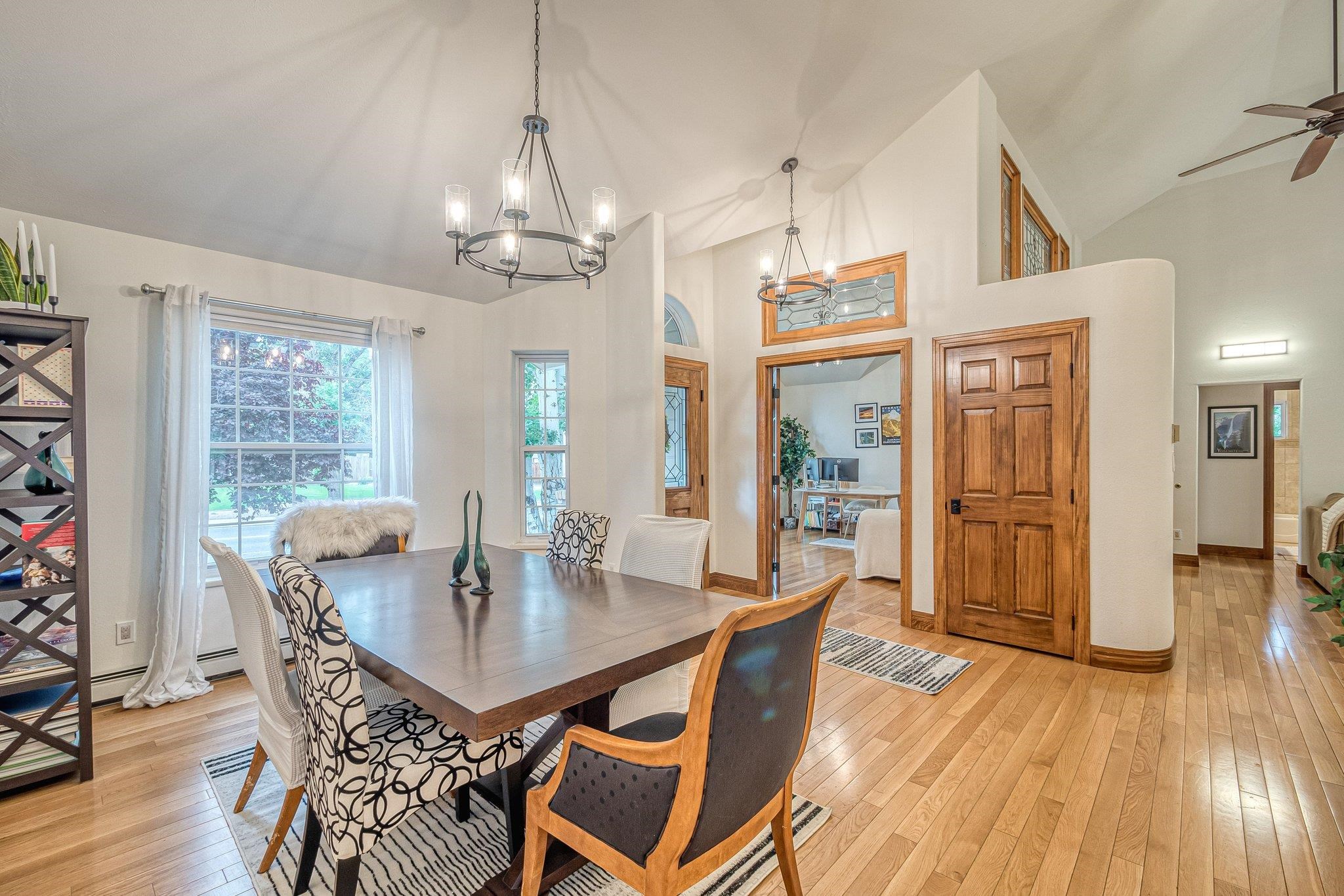 2321 South Rim Drive Grand Junction, CO 81507 - Photo 10 of 41 a view of a dining room with furniture wooden floor and chandelier