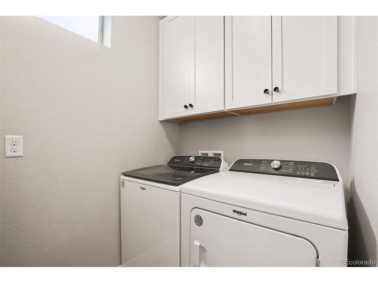 9958 East 63rd Place, Unit 2 Denver, CO 80238 - Photo 24 of 35 a utility room with dryer and washer