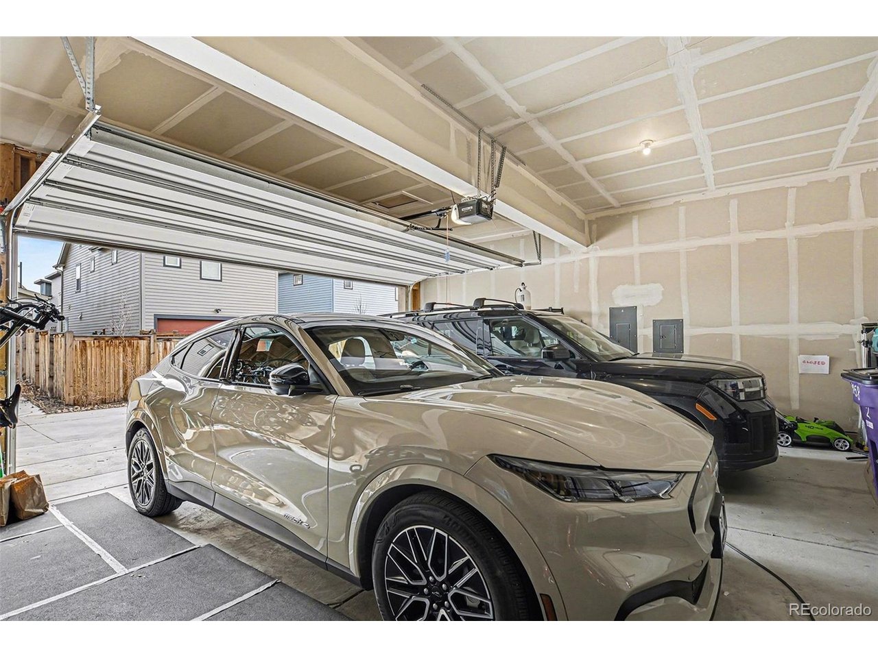 9958 East 63rd Place, Unit 2 Denver, CO 80238 - Photo 26 of 35 a view of a car in a parking garage