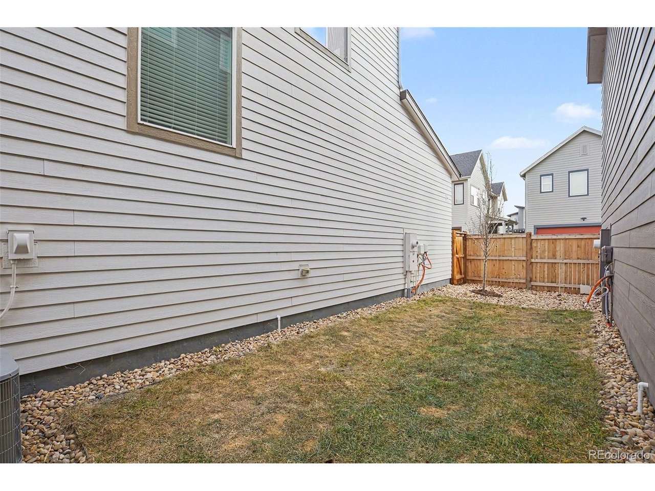 9958 East 63rd Place, Unit 2 Denver, CO 80238 - Photo 29 of 35 a view of a backyard of a house