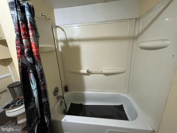 a bathroom with a bathtub