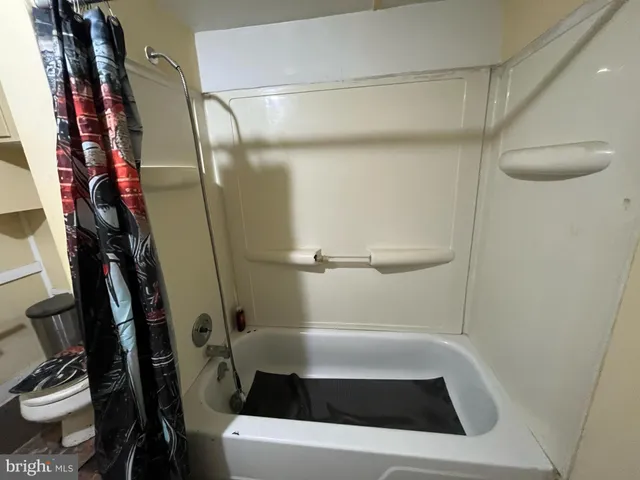 a bathroom with a bathtub