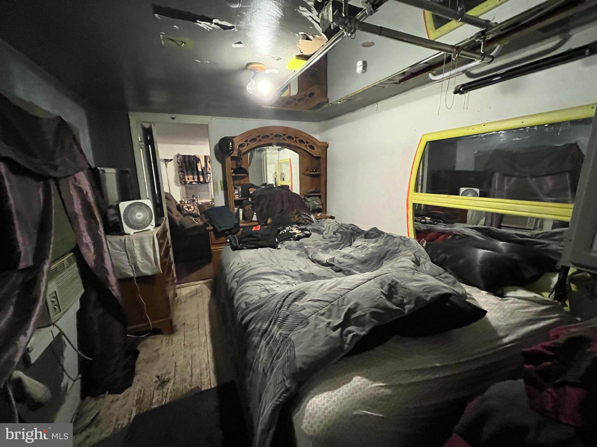 2339 West 3rd Street Middletown, VA 22645 - Photo 17 of 25 a bedroom with a bed and a dresser