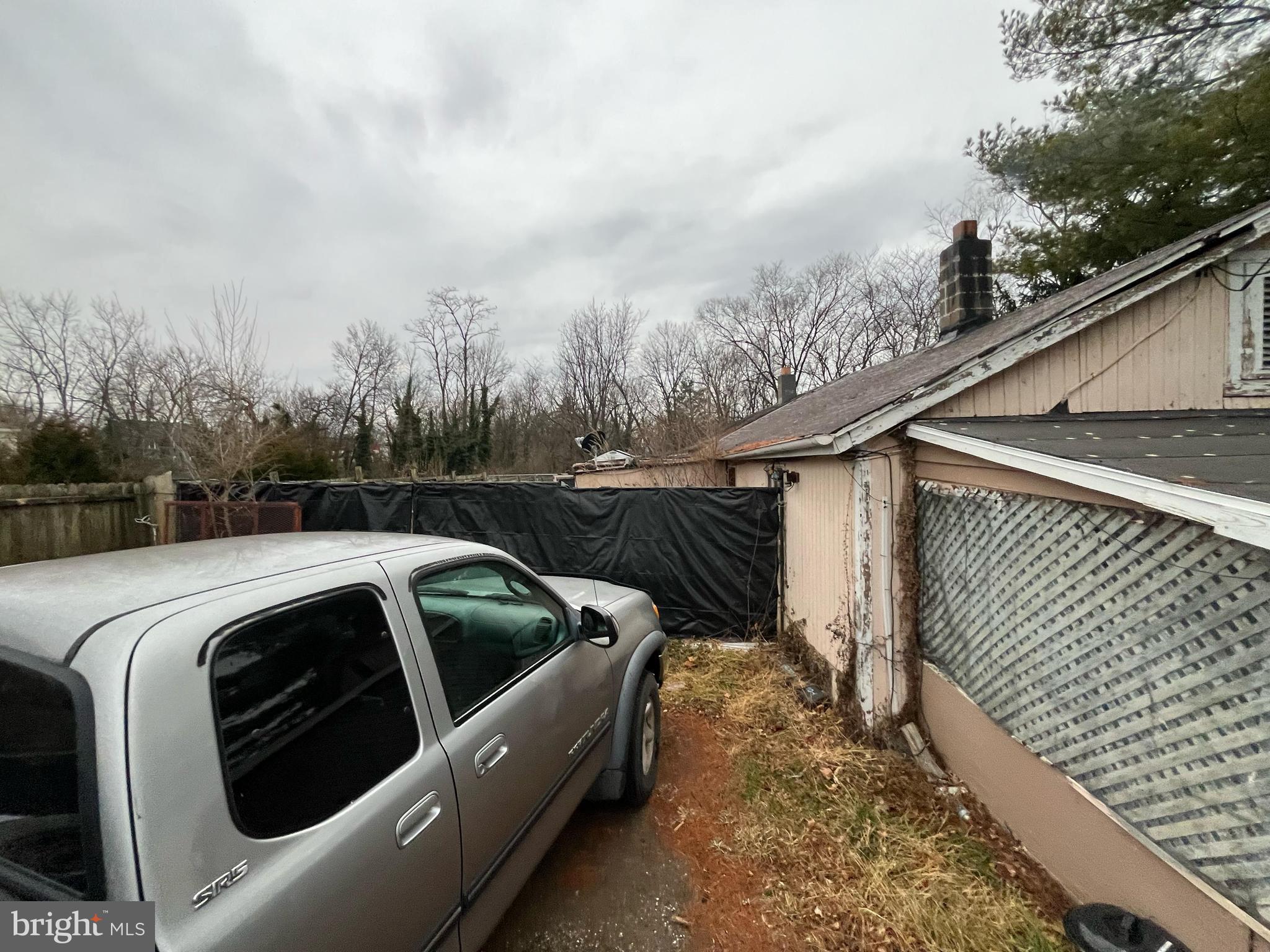 2339 West 3rd Street Middletown, VA 22645 - Photo 2 of 25 a view of roof deck with couches and wooden fence