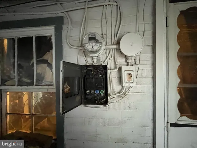 a view of a entryway door with wooden floor